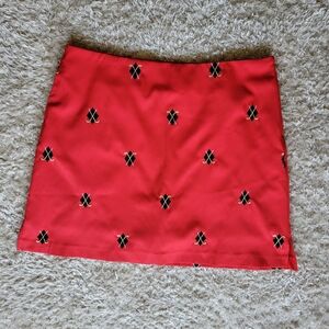 Coral Bay Golf red skort with golf clubs size 14